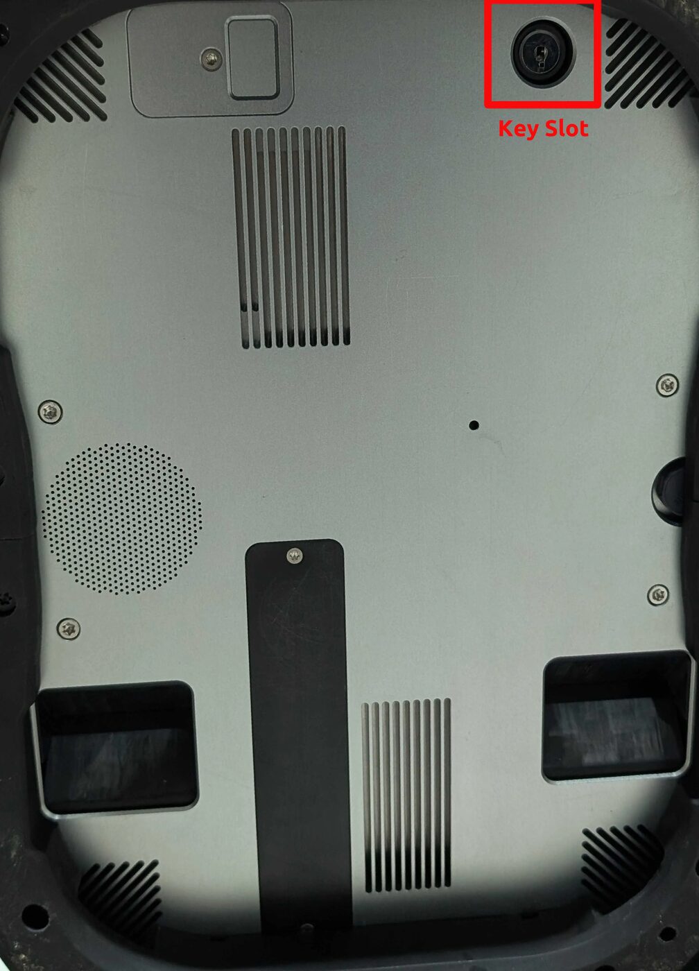 Key slot on the underside of the Ascento robot used to power it on